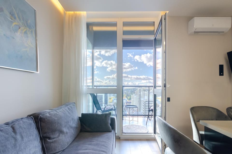 View (from property/room), Balcony/Terrace, Living room, Seating area, air conditioner
