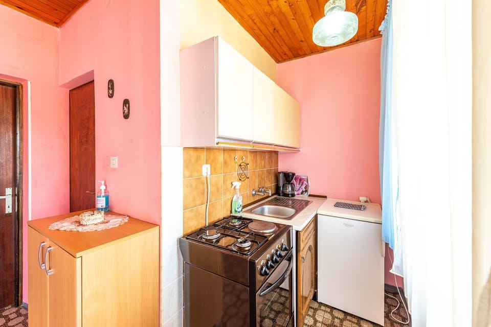 Kitchen or kitchenette, stove