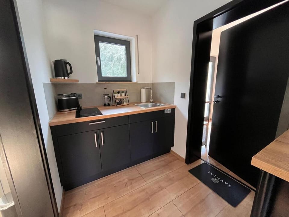 Kitchen or kitchenette, stove, toaster