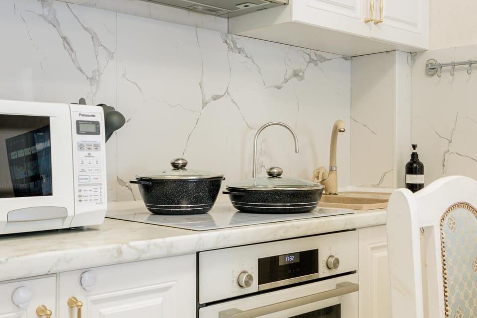 Kitchen or kitchenette, stove