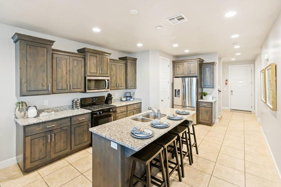 Kitchen or kitchenette, dishwasher, oven, stove, toaster