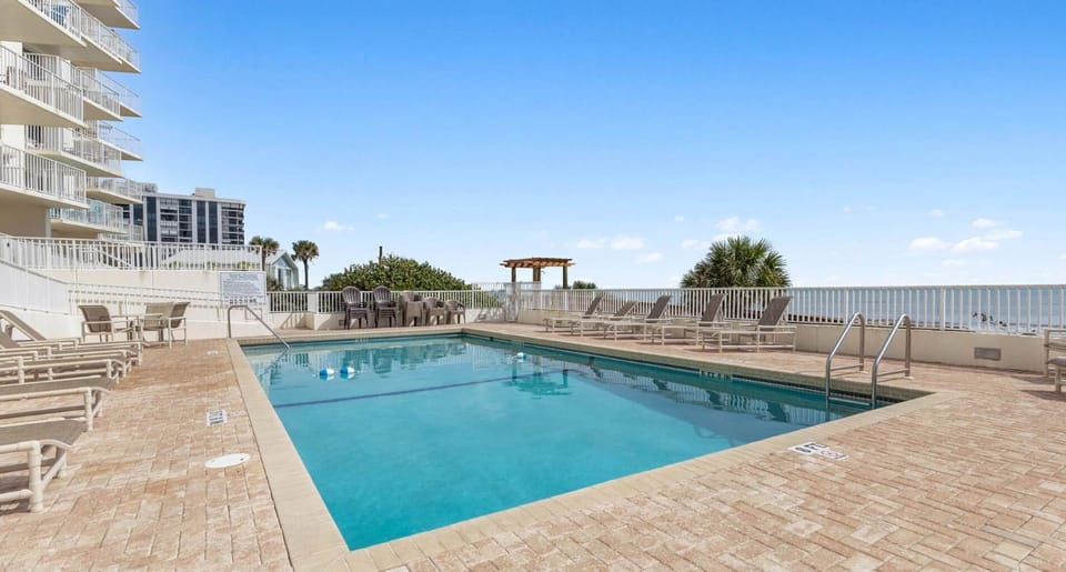 Direct oceanfront 2/2 corner condo with large balcony, heated pool, and garage parking Apartment in Ormond By The Sea