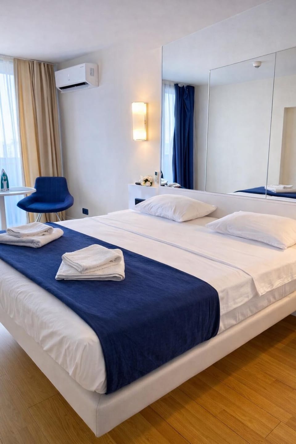 Bed, Photo of the whole room, Bedroom, towels, air conditioner
