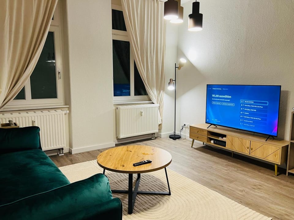 Property building, Communal lounge/ TV room, TV and multimedia, Living room, Seating area, Evening entertainment, internet, air conditioner