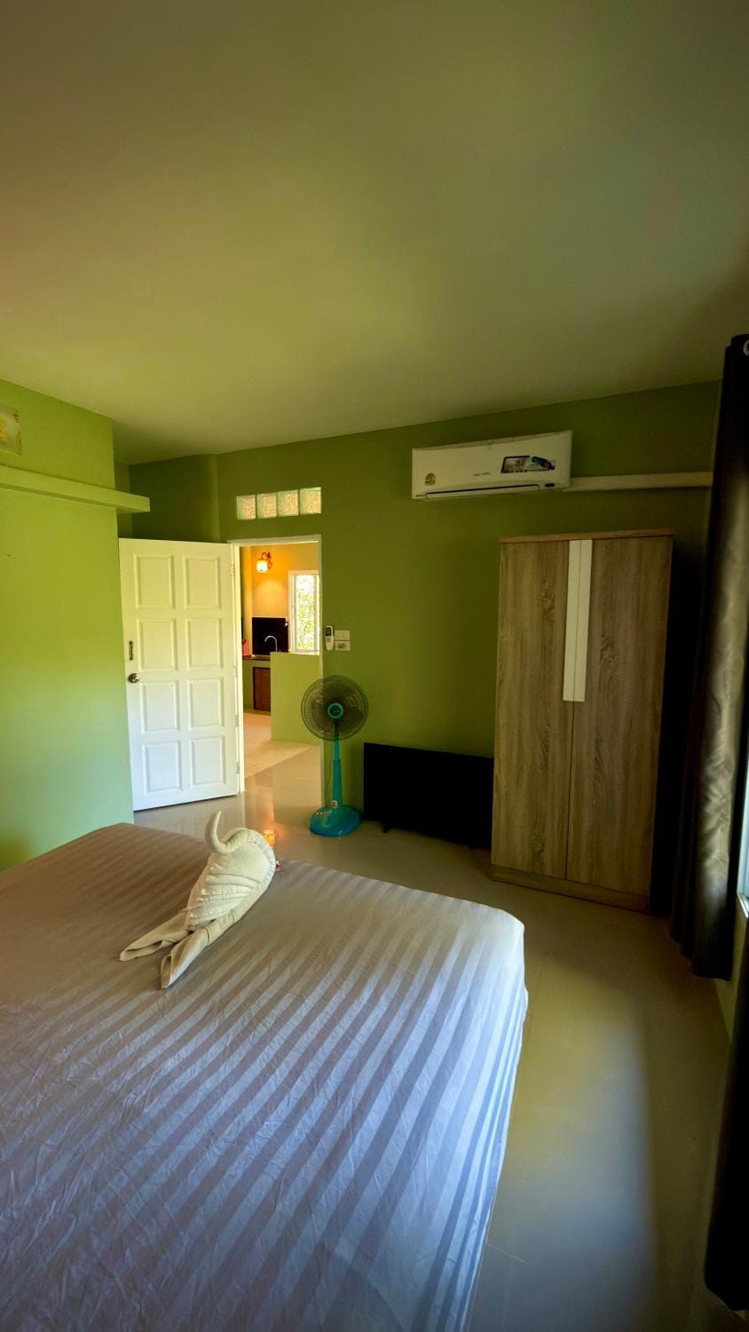 Bed, Bedroom, towels, wardrobe, air conditioner