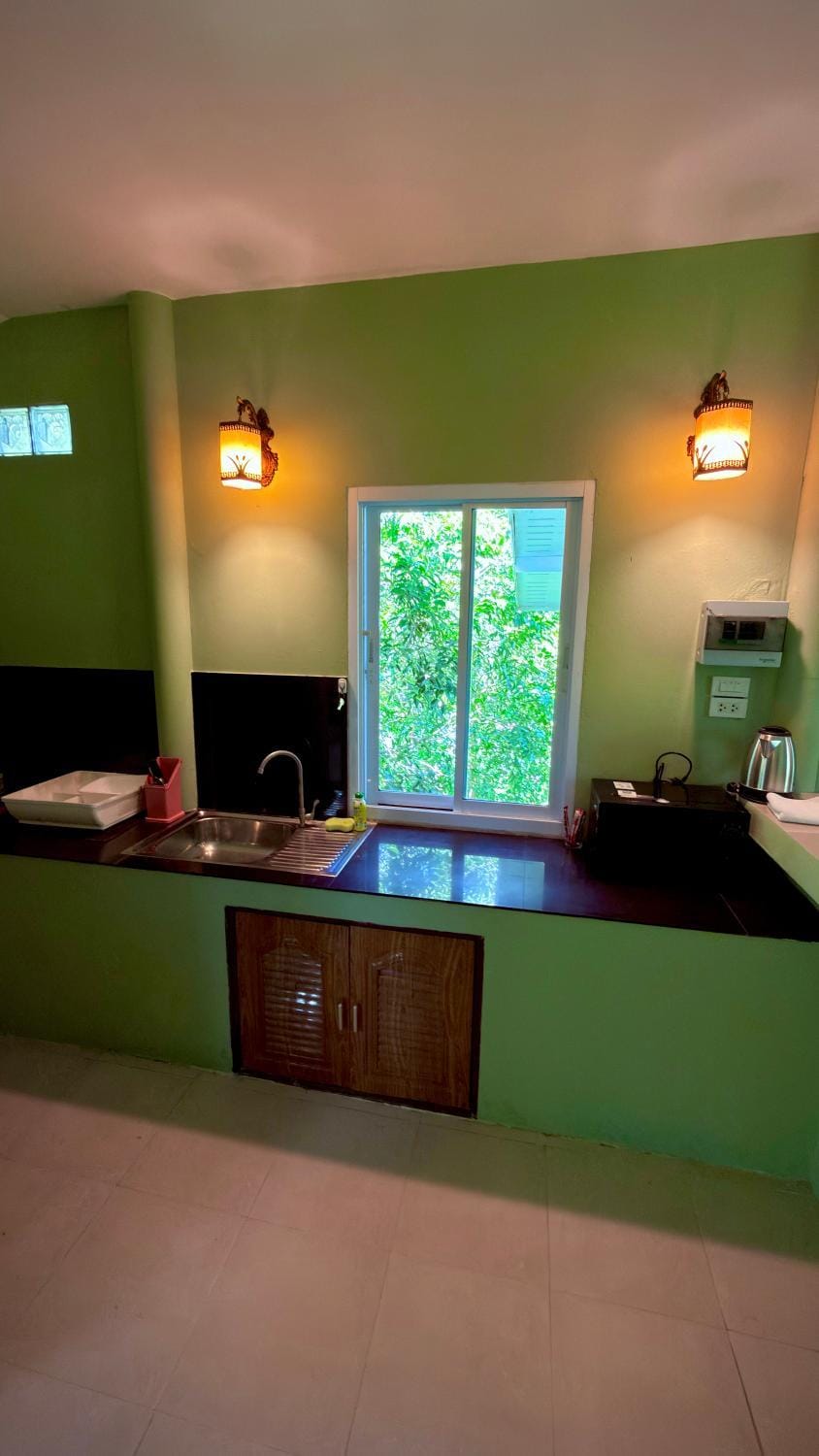 Kitchen or kitchenette, microwave, stove