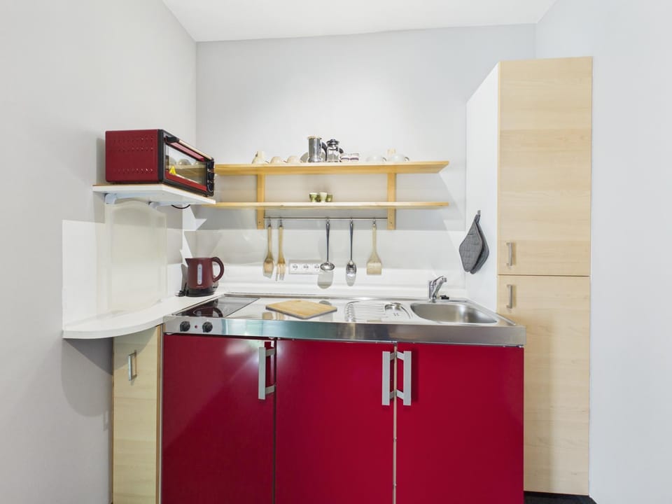 Kitchen or kitchenette, stove
