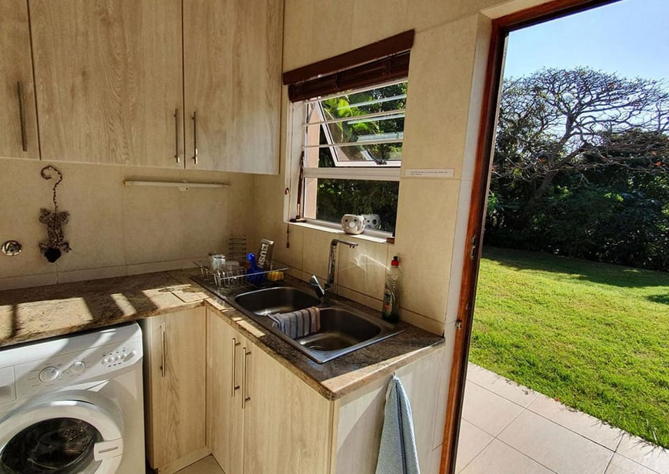 Kitchen or kitchenette, washing machine