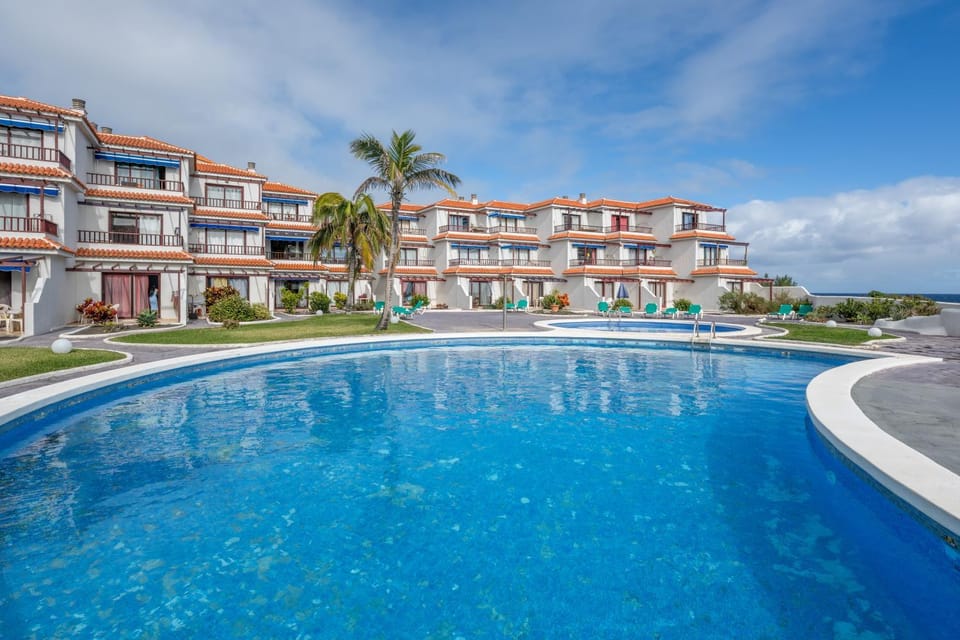 Property building, Living room, Swimming pool