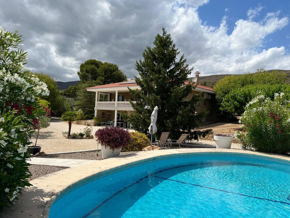 Property building, Natural landscape, Garden, Garden view, Mountain view, Swimming pool