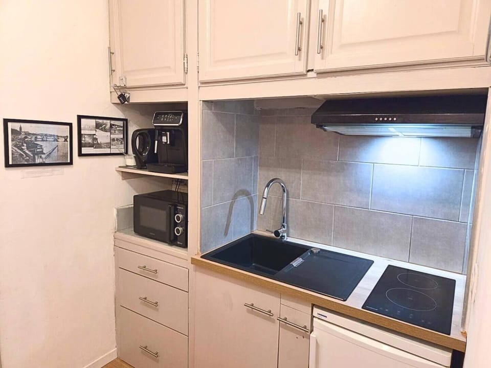 Kitchen or kitchenette, stove