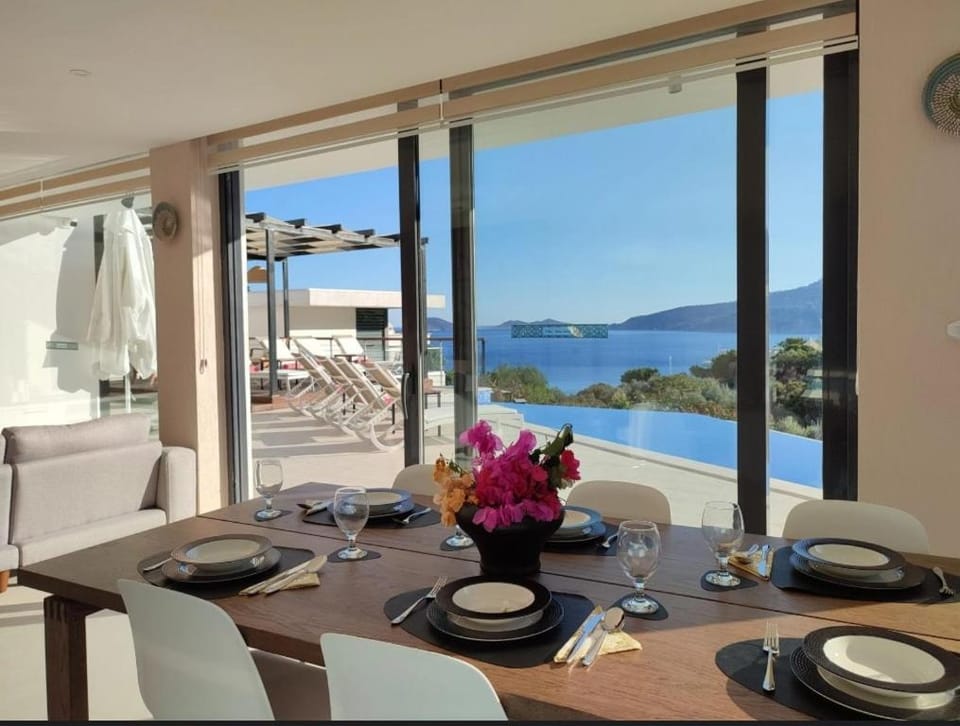 Day, Living room, Seating area, Dining area, Mountain view, Pool view, Sea view, Swimming pool
