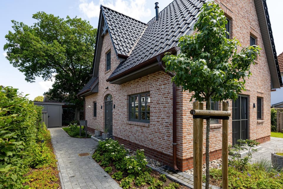 Modernes Ferienhaus mit Sauna, eingezäuntem Garten und Strandnähe Ideal für Familien, Freunde und Hundeliebhaber House in Zingst