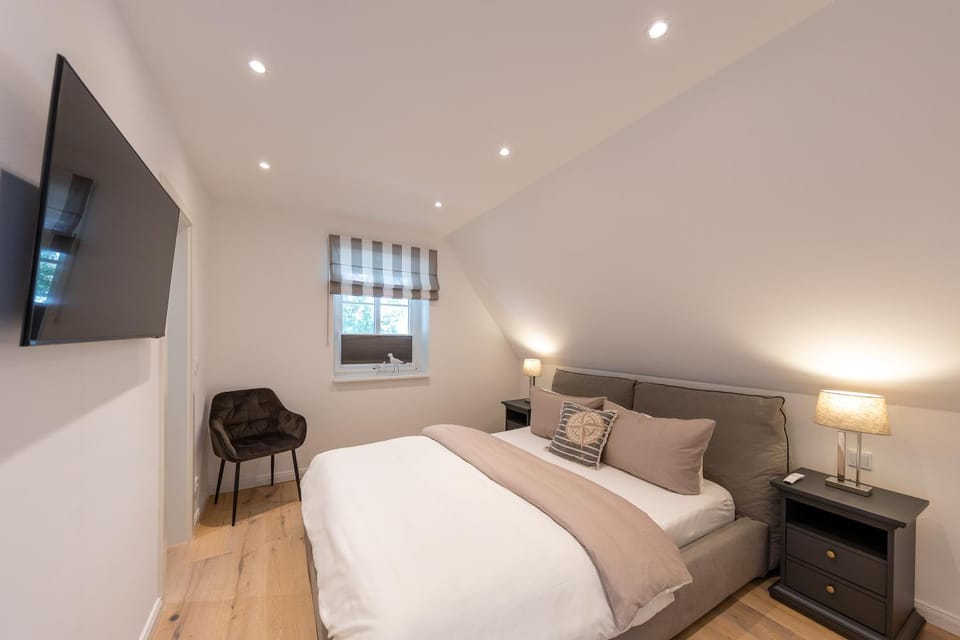 Modernes Ferienhaus mit Sauna, eingezäuntem Garten und Strandnähe Ideal für Familien, Freunde und Hundeliebhaber House in Zingst
