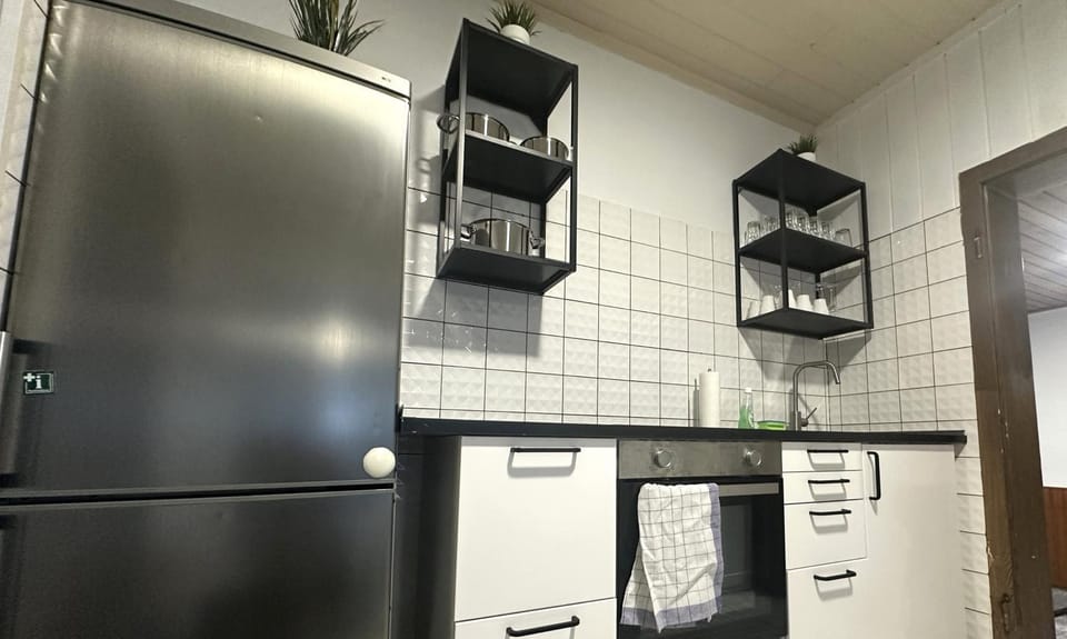 Kitchen or kitchenette, oven, stove