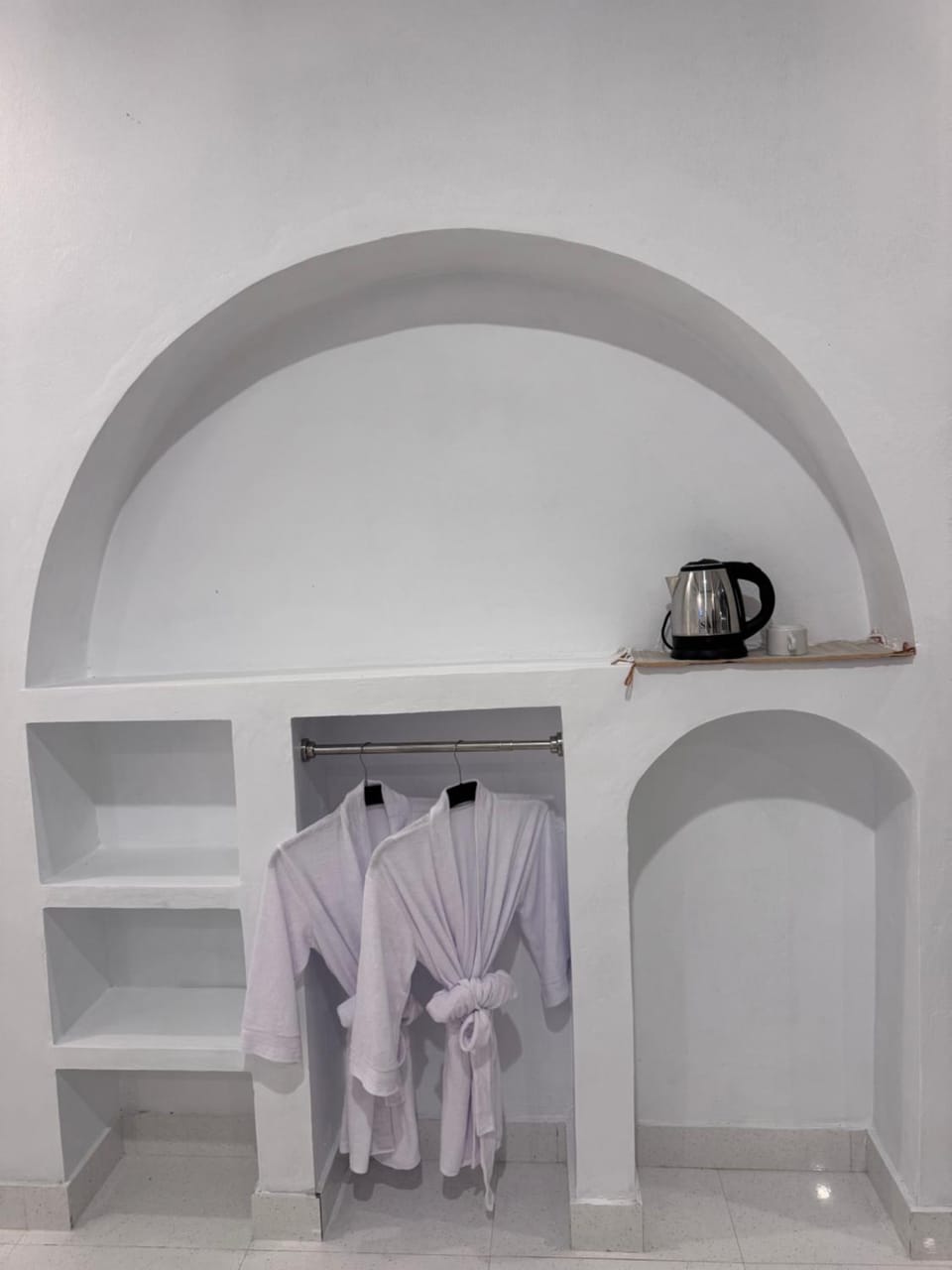 Photo of the whole room, furniture, towels, wardrobe