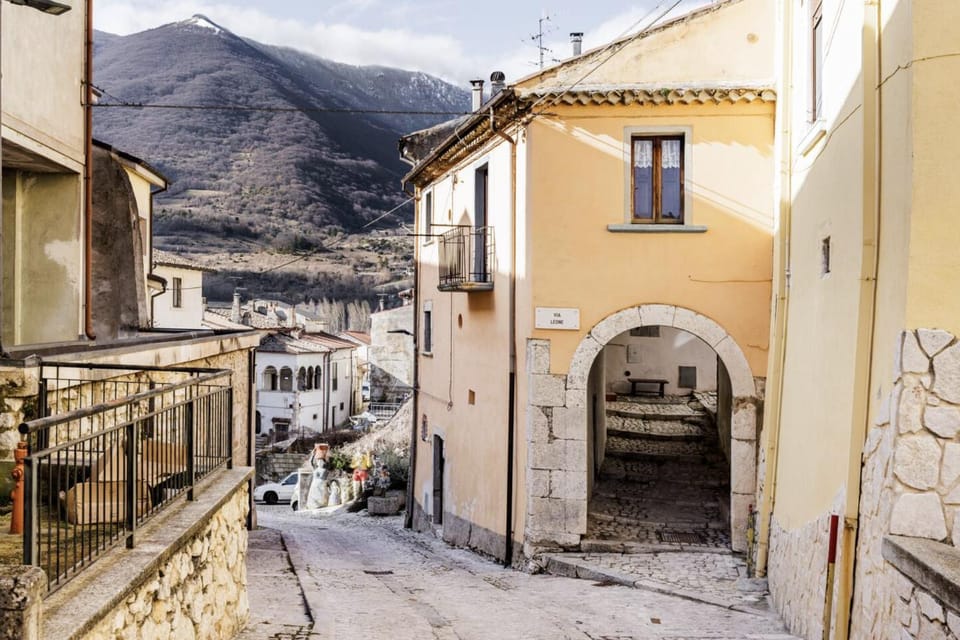 Property building, Day, Neighbourhood, Natural landscape, City view, Mountain view, Street view, Location, Parking