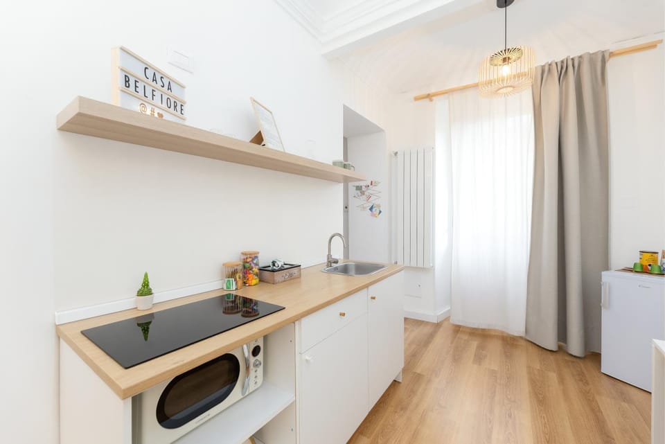 Kitchen or kitchenette, stove, washing machine