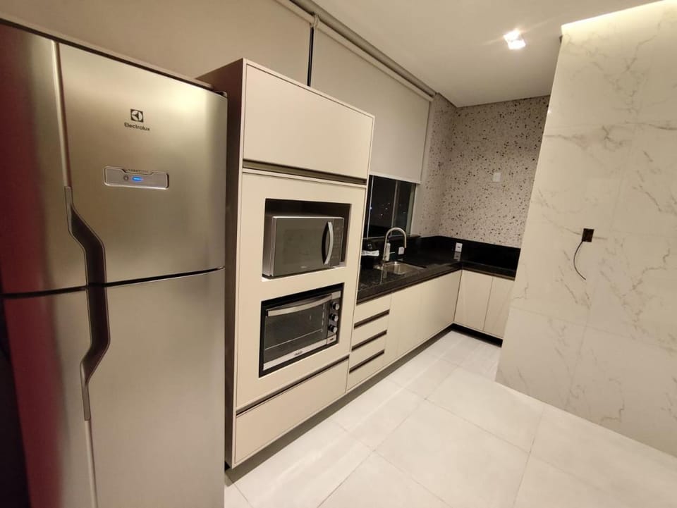 Dining area, microwave, minibar, oven, stove