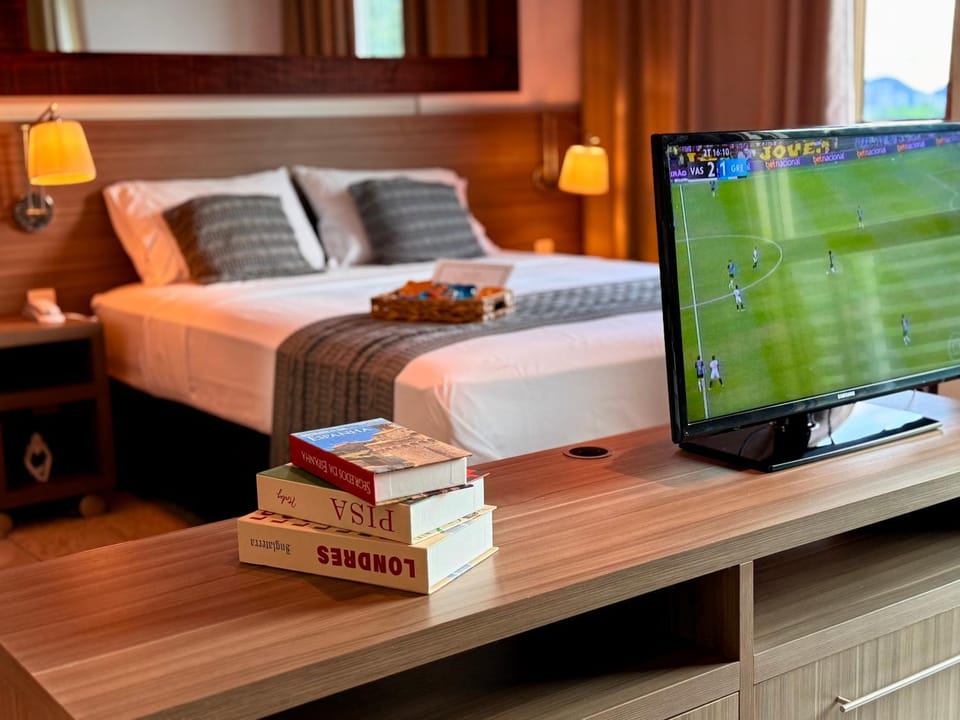 Communal lounge/ TV room, Bed, Bedroom