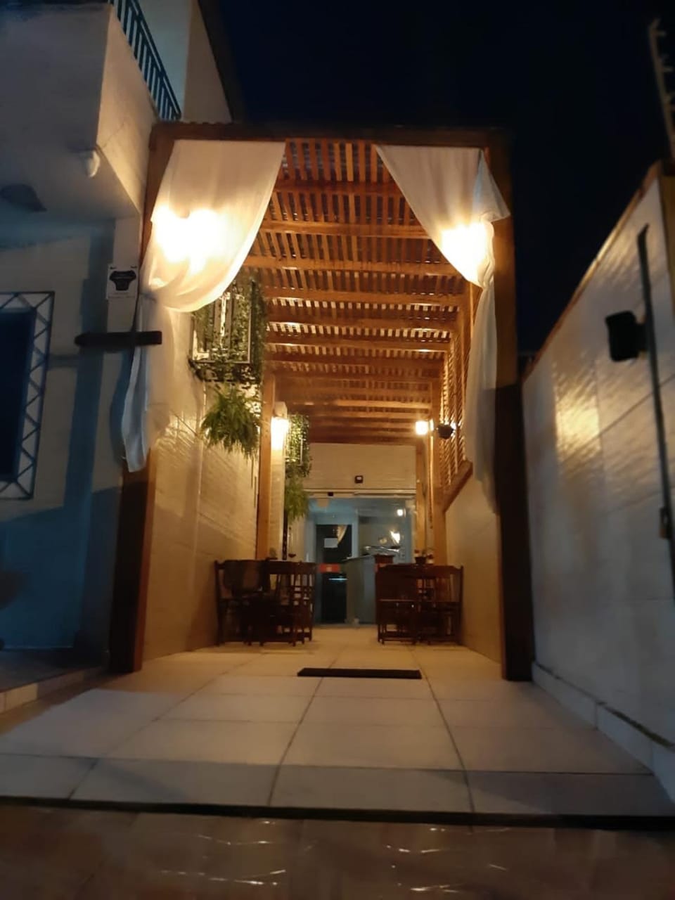 Property building, Patio, View (from property/room), Balcony/Terrace, Living room, Seating area, Dining area