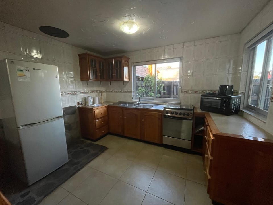 Kitchen or kitchenette, oven, stove, toaster