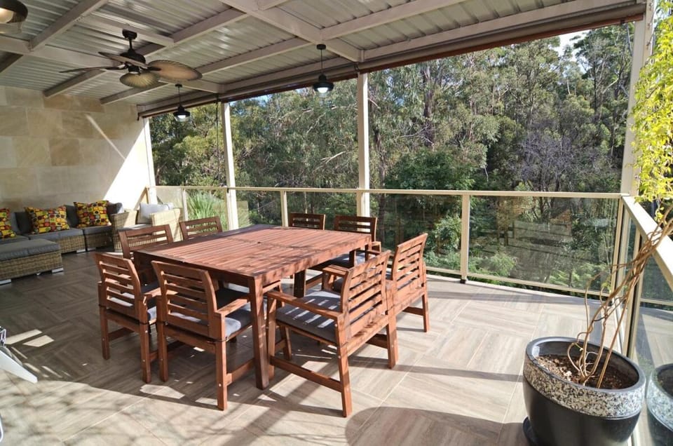 Coastal family retreat sun-drenched outdoor patio House in Eden