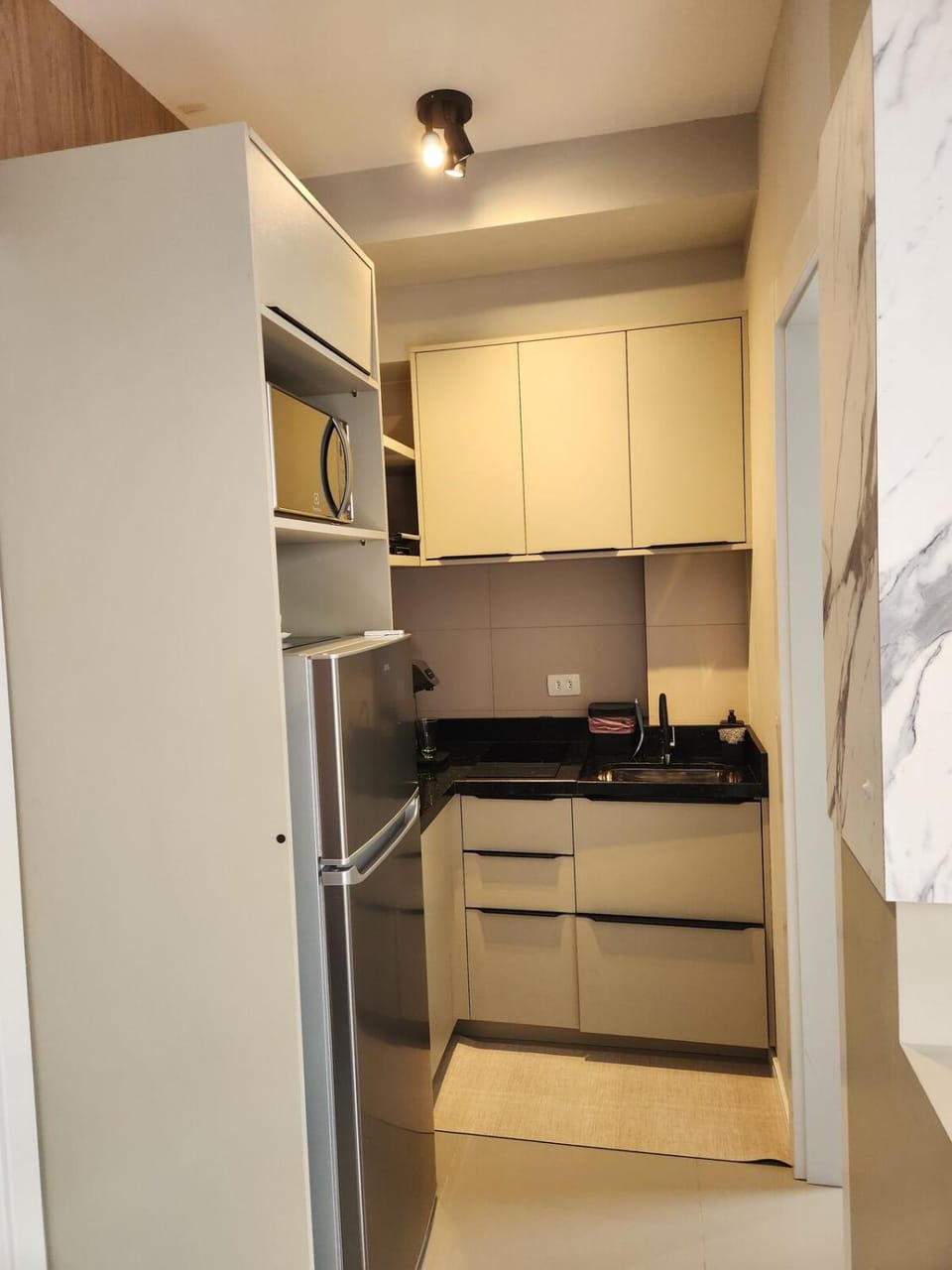 Studio moderno com cara de casa Apartment in Curitiba