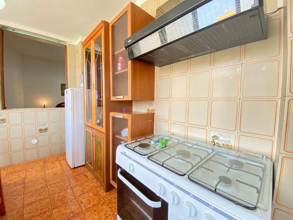 Kitchen or kitchenette, oven, stove