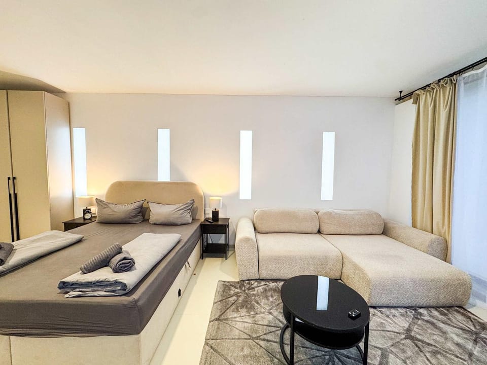 Bed, Living room, Seating area, Bedroom, towels