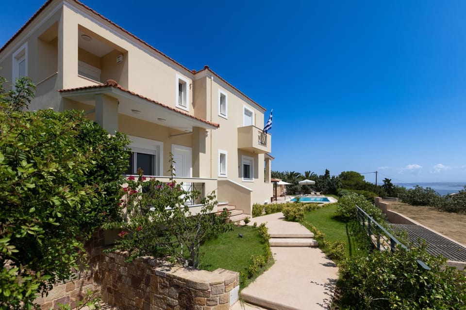 Property building, Natural landscape, Garden, Garden, Garden view, Pool view, Sea view, Swimming pool
