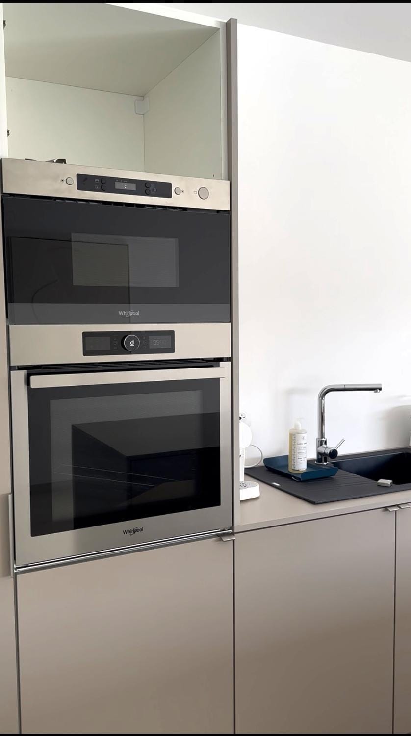 Kitchen or kitchenette, oven