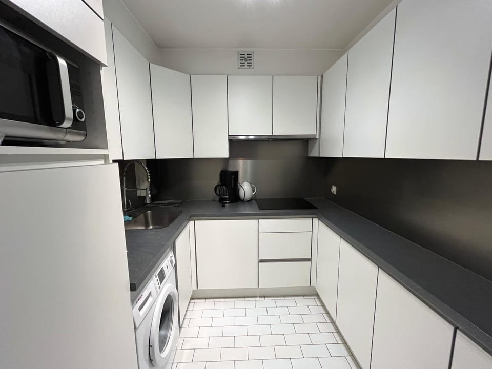 Kitchen or kitchenette, dishwasher, stove, washing machine, kitchen