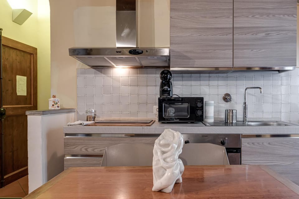 Kitchen or kitchenette, stove