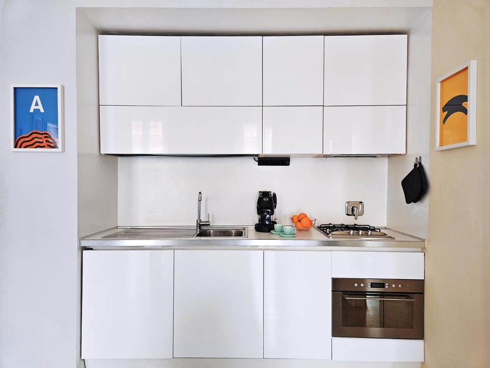 Kitchen or kitchenette, stove, toaster