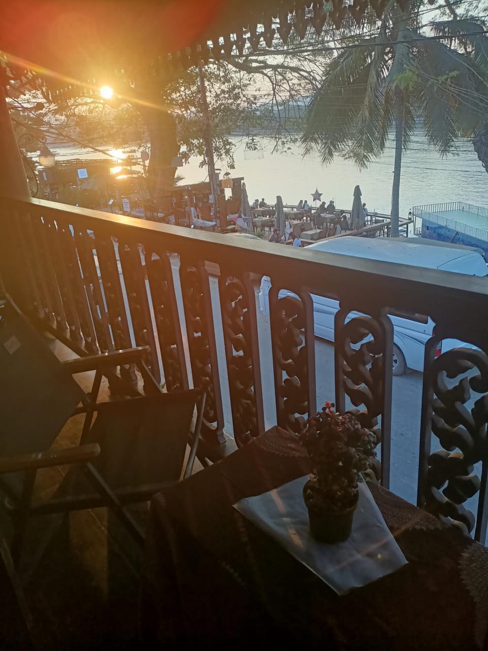 View (from property/room), Balcony/Terrace, Seating area, River view, Sunset