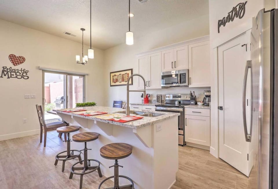 Kitchen or kitchenette, dishwasher, oven, stove