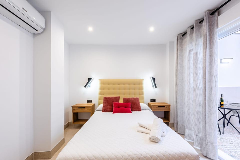 Bed, Photo of the whole room, Bedroom, towels, air conditioner