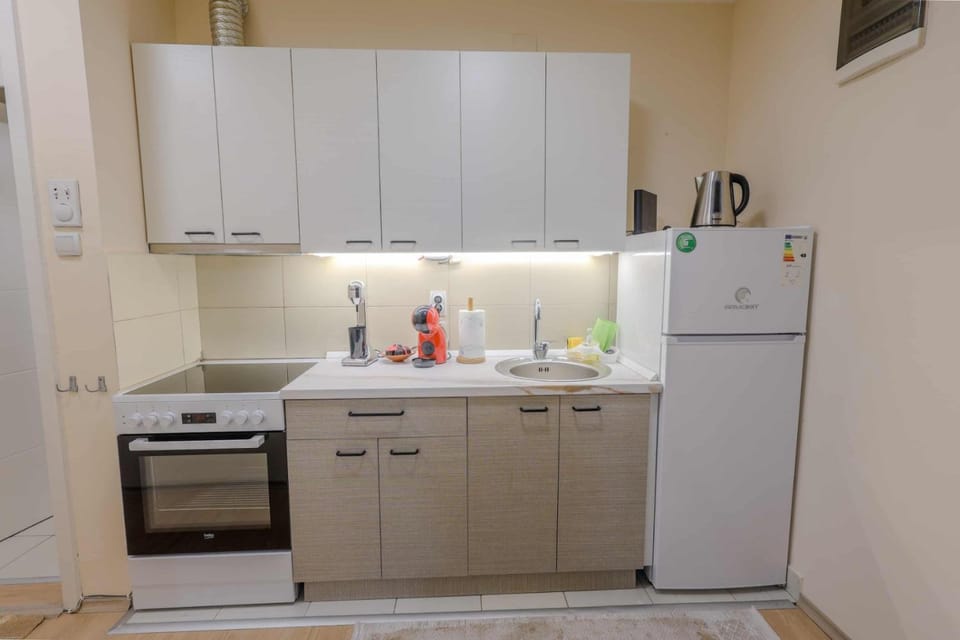 Kitchen or kitchenette, stove, toaster