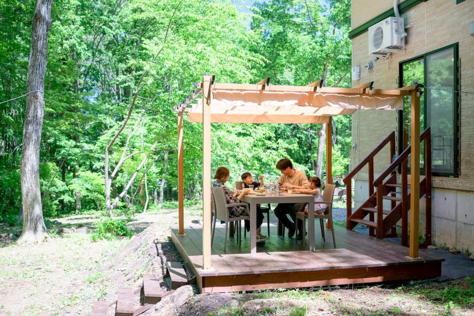 Property building, Patio, Spring, Day, People, Garden, View (from property/room), Balcony/Terrace, Garden view, group of guests