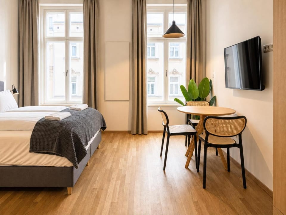 Bed, TV and multimedia, Seating area, Bedroom, hair dresser