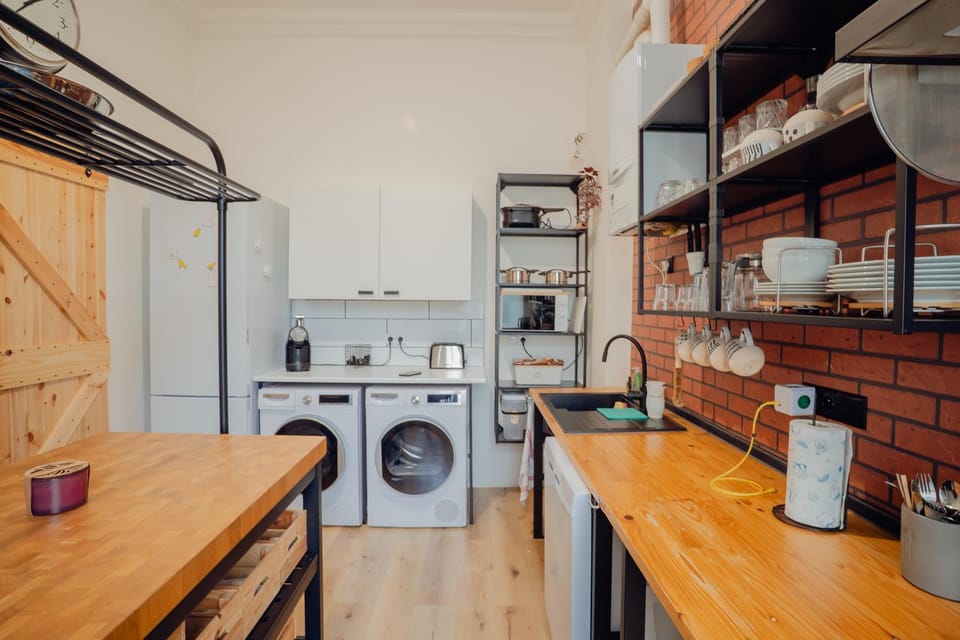Kitchen or kitchenette, dishwasher, toaster, washing machine, dryer