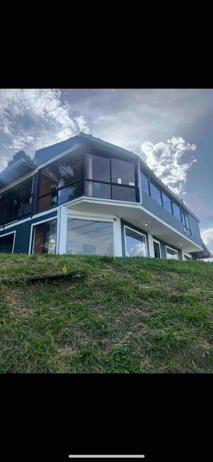 Villa with Spectacular Medellin View with Pool and Mini Basket-Futbol Field Villa in Medellin