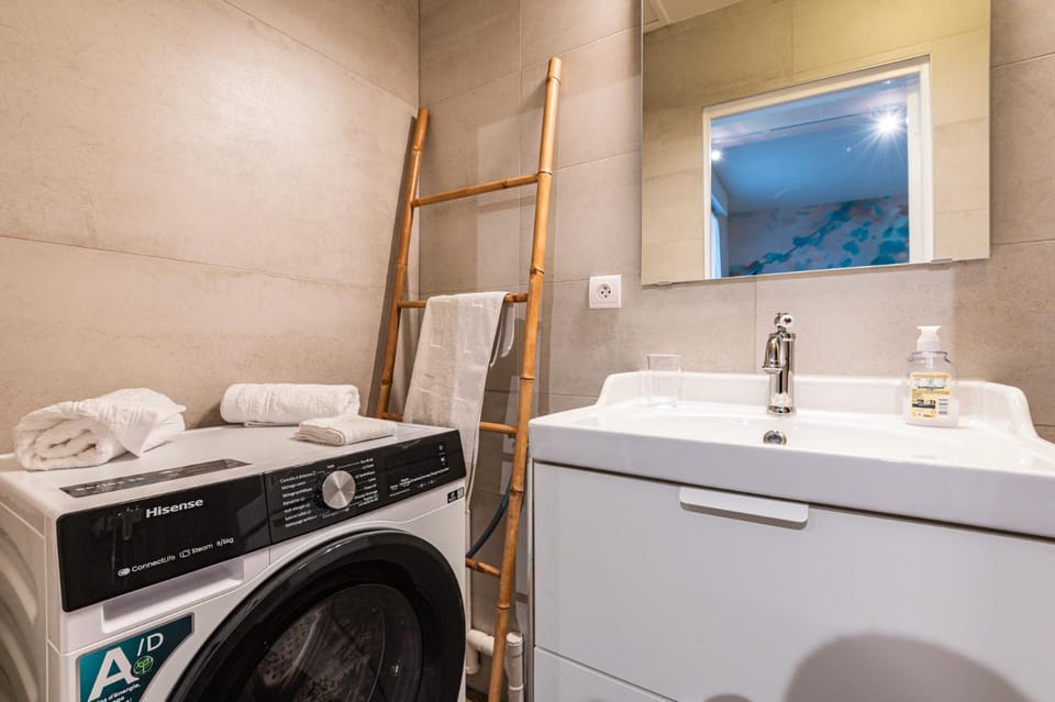 Bathroom, towels, washing machine, dryer