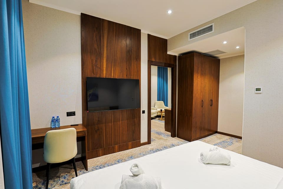 Bed, Bedroom, towels, wardrobe, air conditioner
