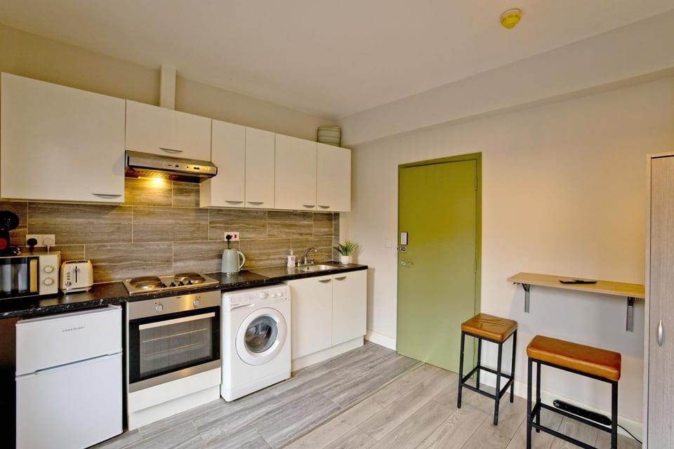Kitchen or kitchenette, oven, stove