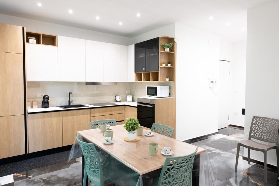 Kitchen or kitchenette, Living room, Seating area, Dining area, oven, stove, toaster