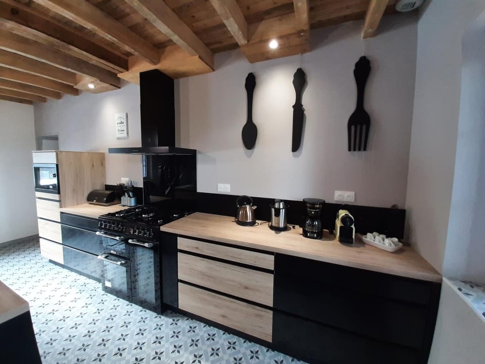 Kitchen or kitchenette, dishwasher, oven, stove, toaster