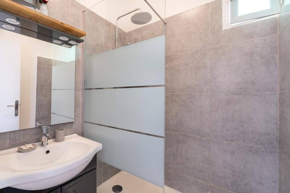 Shower, Bathroom, flat iron, hair dryier, towels