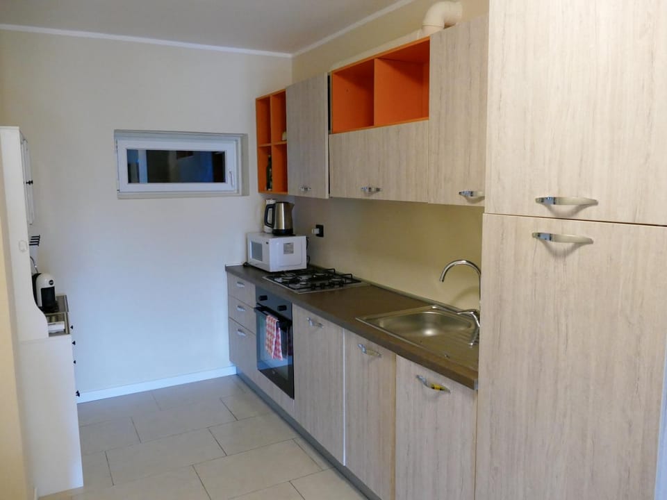Kitchen or kitchenette, oven, stove